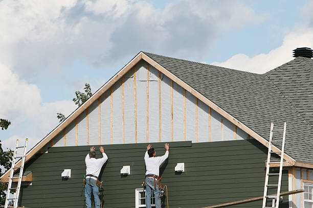 Professional Siding Installation technician working in Blue Point, NY